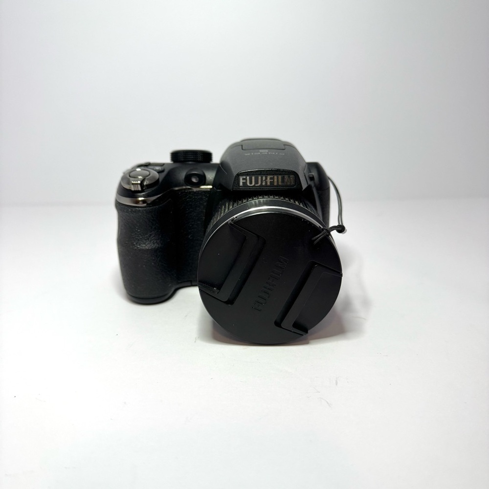 Fujifilm Black Digital Camera with Ergonomic Design and Prominent Lens